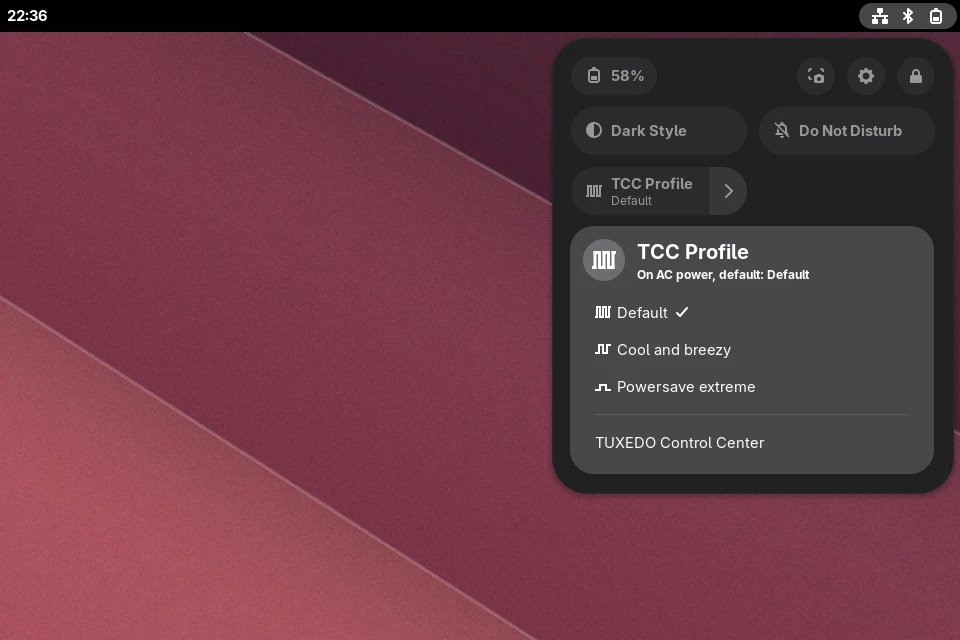 The GNOME Quick Settings with the open “TCC Profile” menu: the profiles Default, Cool and breezy and Powersave extreme, plus the TUXEDO Control Center entry