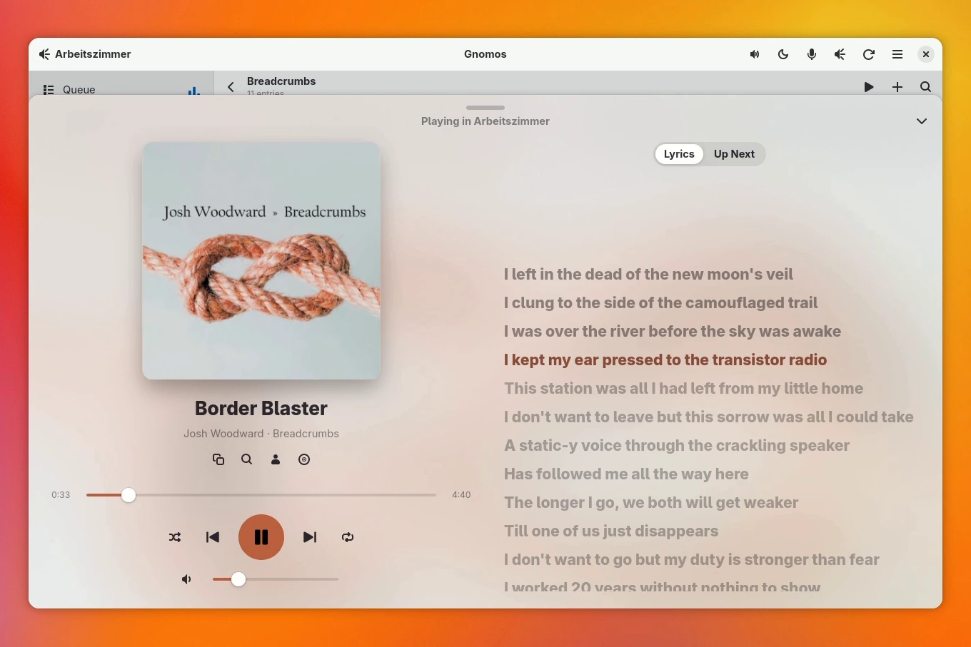 Now Playing view with a large cover in its own colors and synced lyrics