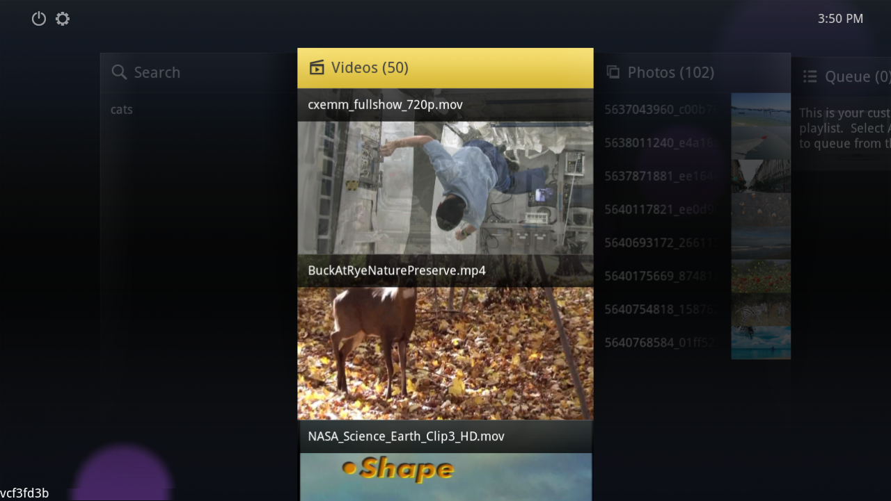 Startbildschirm des Media Explorers mit den Spalten Videos, Photos und Queue und einer Vorschau auf ein Naturvideo