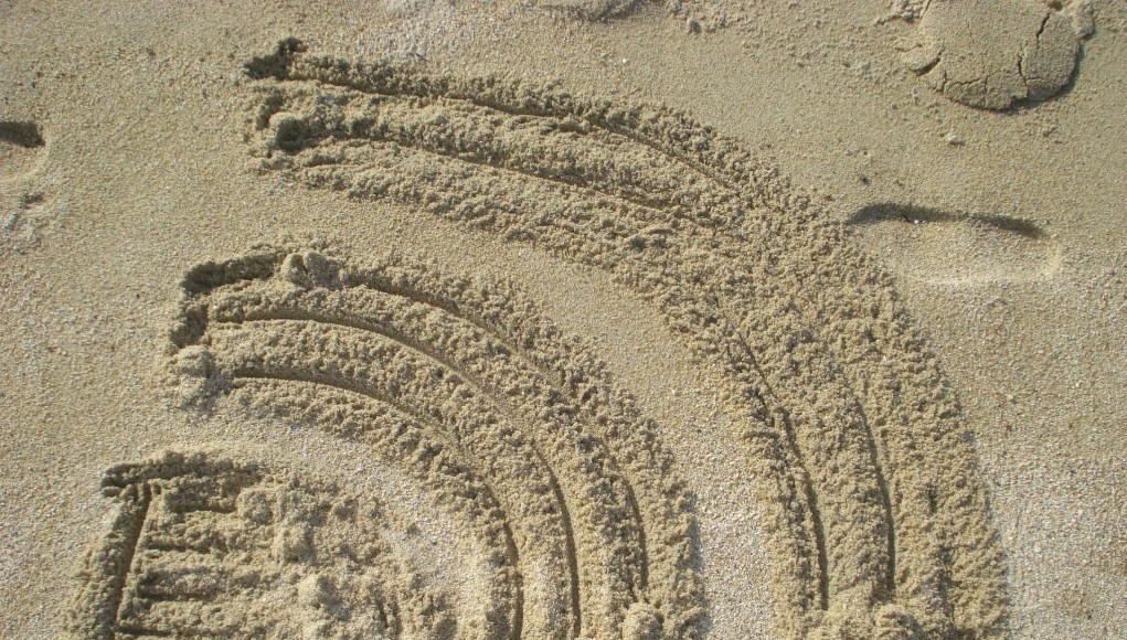 RSS-Icon im Sand