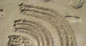 RSS-Icon im Sand